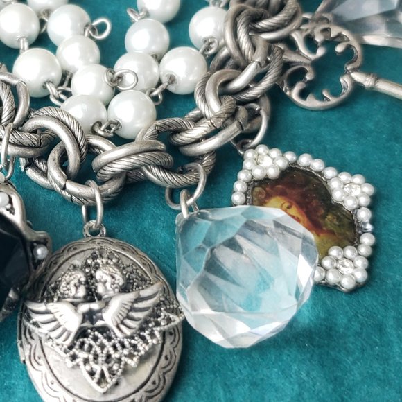 2/25$ Silver tone bracelet with charms and locket - Picture 4 of 5